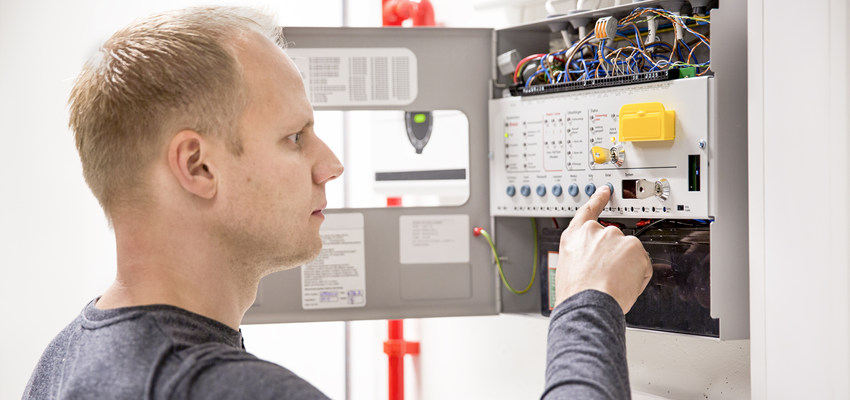 fier_engineer_at_panel