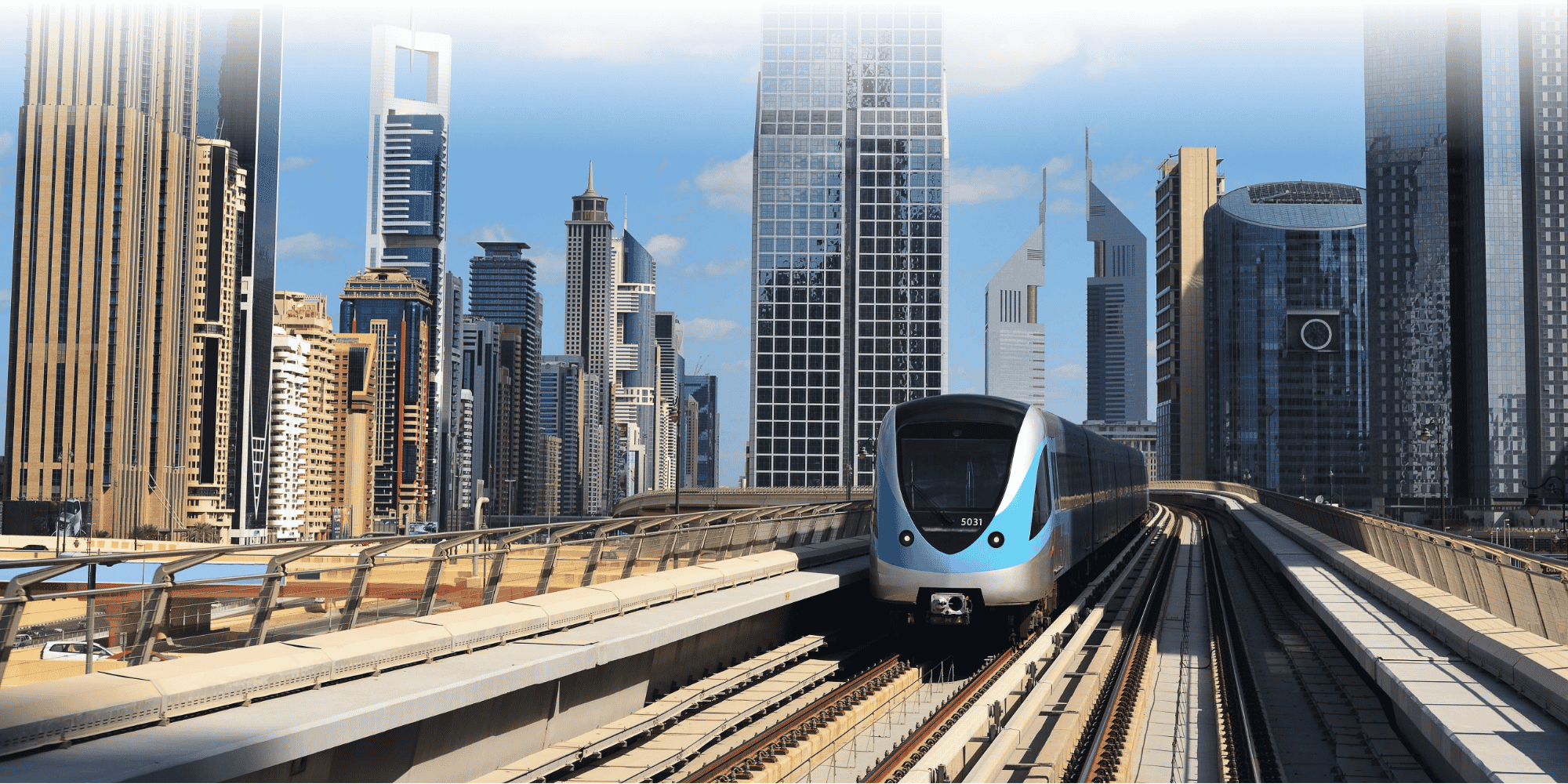 Metro in front of a large city landscape made of glass and all different sizes in the background