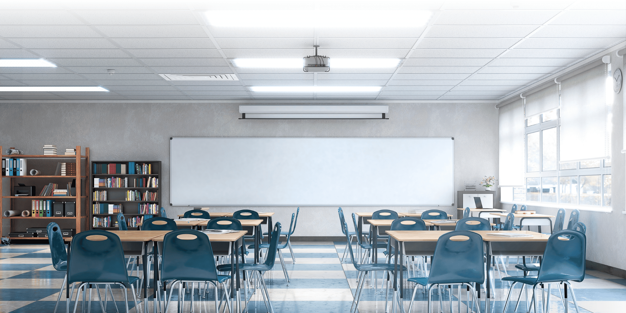 Bright classroom with rows of teal chairs at individual desks, a whiteboard, overhead projector, bookcase and wall-mounted air conditioning unit.