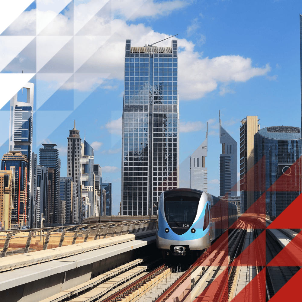 Metro in front of a large city landscape made of glass and all different sizes in the background. This is overlayed with Hochiki triangle branding - red and white