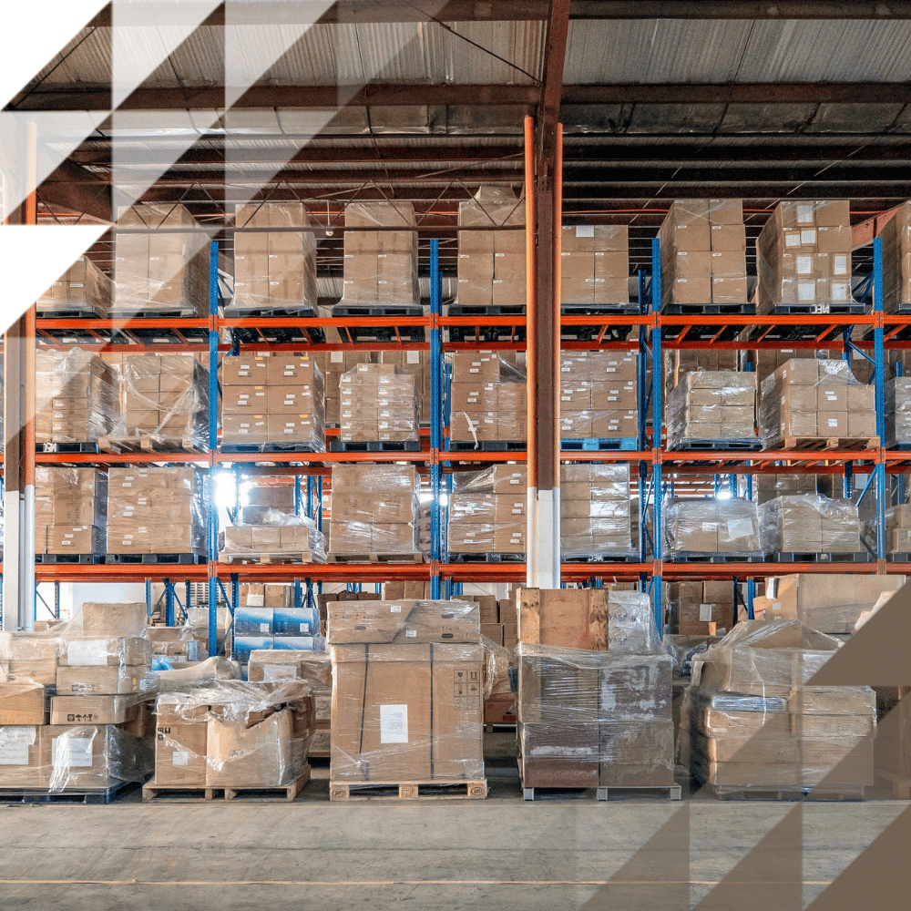 Plastic-wrapped box pallets stacked on warehouse racks, ready for shipping.