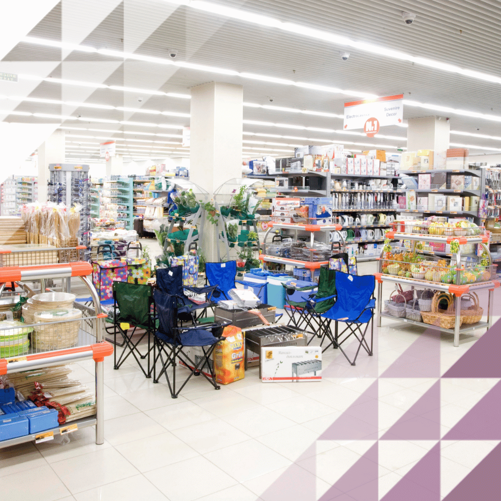 Large retail store with different items such as chairs, cooking appliances and outdoor living