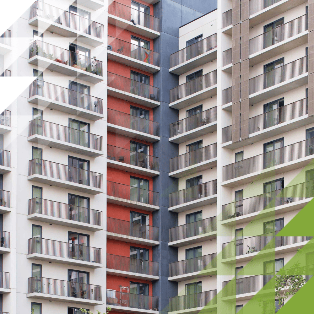 Modern high-rise student accommodation with multi-floor balconies and grey, cream, and red panelling.