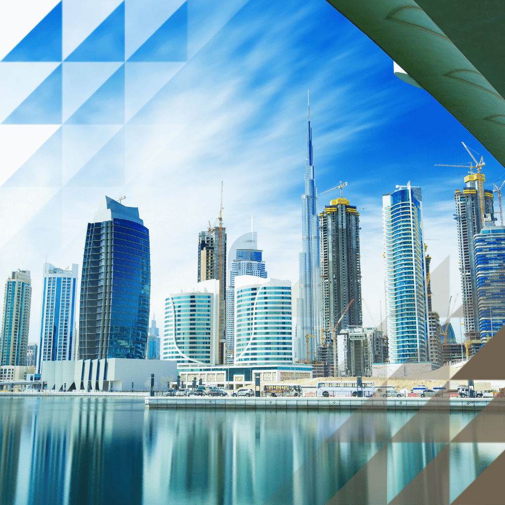 Dubai's Business District with glass buildings reflecting off the water