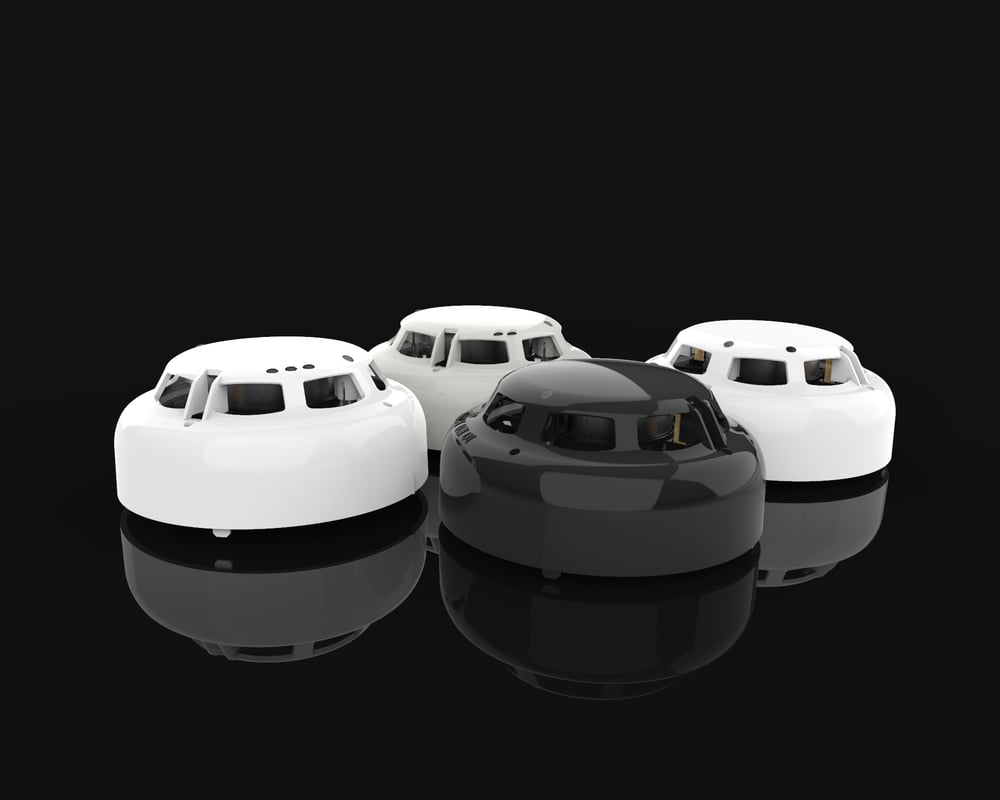 Range of alarm sensors on a black background