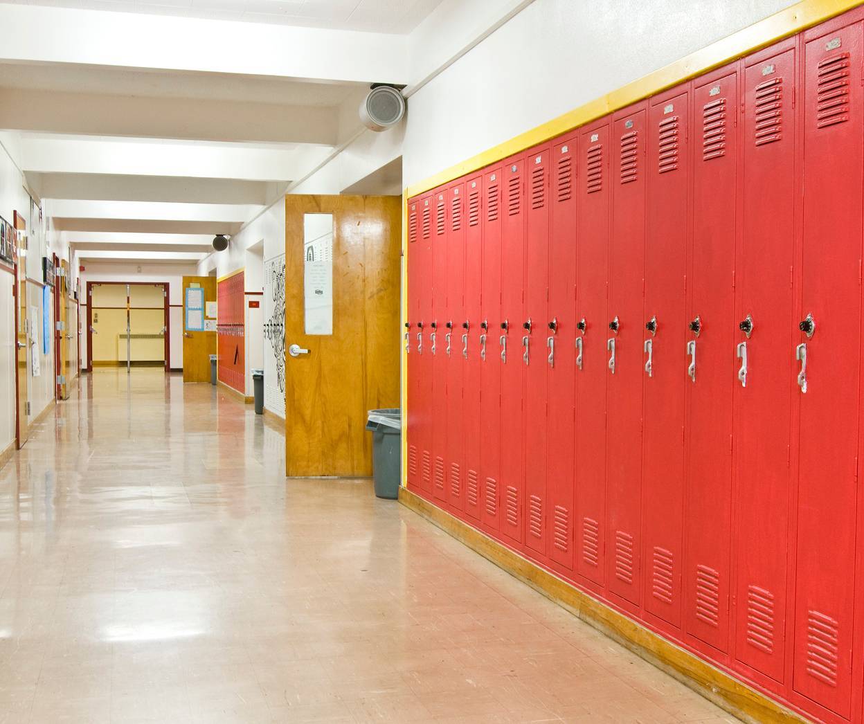 School hallway with red lockers
