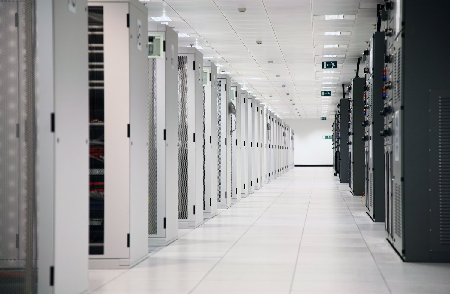 white and black data centre corridor